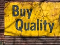 Buy quality. Vintage sign Royalty Free Stock Photo