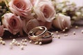 Vintage Sile Wedding Background with Gold Rings and Beautiful Flower Royalty Free Stock Photo