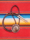 Vintage Silver Bolo Tie on colorful background. Royalty Free Stock Photo
