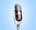 Vintage silver microphone close up on blue background 3d render Royalty Free Stock Photo