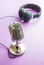 Vintage silver microphone and headphones Royalty Free Stock Photo