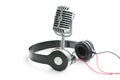 Vintage silver microphone and headphones Royalty Free Stock Photo