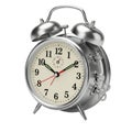 Vintage silver twin bell alarm clock with wind-up key Royalty Free Stock Photo