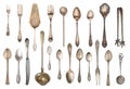 Vintage Silverware, antique spoons, forks, knives, ladle, cake shovels isolated on isolated white background. Antique silverware.