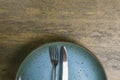 Vintage silverware on rustic wooden background. Top view of kitchen cutlery setting on grunge restaurant table Royalty Free Stock Photo