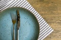 Vintage silverware on rustic wooden background. Top view of kitchen cutlery setting on grunge restaurant table Royalty Free Stock Photo