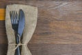 Vintage silverware on rustic wooden background. Top view of kitchen cutlery setting on grunge restaurant table Royalty Free Stock Photo