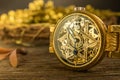 Vintage skeleton watch with Star of David on wood background