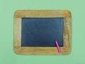 Vintage slate chalkboard and pink chalk pastel Royalty Free Stock Photo