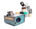 Vintage slide projector is an opto-mechanical device for showing photographic slides. Isolated on white