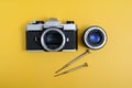 A vintage SLR camera with lens detected. Royalty Free Stock Photo