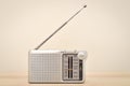 Vintage small radio on the wooden table Royalty Free Stock Photo