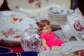 Vintage souvenir doll and porcelain dishes in a market
