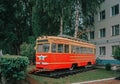 Vintage Soviet tram among greenery