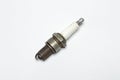 Vintage spark plug on gray background