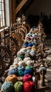 Vintage spinning wheels with colorful yarn Royalty Free Stock Photo