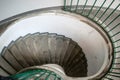 Vintage spiral staircase with metal green railings Royalty Free Stock Photo