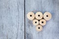 Vintage spools of thread on a wooden table