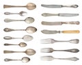 A set of antique fine silverware. Vintage spoons, forks and knifes isolated on a white background. Royalty Free Stock Photo