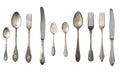 Vintage spoons, forks and knives isolated on a white background. Royalty Free Stock Photo