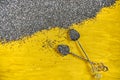 Vintage spoons with fresh chia seeds on yellow wooden board. Raw healthy chia superfood. Scattered chia seeds on wooden background