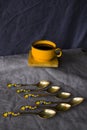 Vintage spoons, silverware, black coffee cup on the table Royalty Free Stock Photo