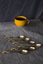Vintage spoons, silverware, black coffee cup on the table Royalty Free Stock Photo