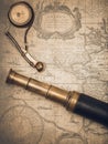 Vintage spyglass and whistle of the boatswain. Royalty Free Stock Photo