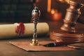 Vintage stamp, judge gavel, envelope and testament on a wooden desk Royalty Free Stock Photo