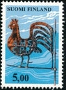 Vintage stamp printed in Finland 1977 show Weathercock