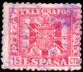 Vintage stamp printed in Spain 1940 shows coat of arms and the word telegrafos