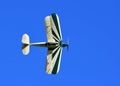 Vintage Stampe SV4C Biplane G-BPLM  in flight against Blue Sky. Royalty Free Stock Photo