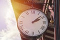 Vintage station clock on natural background