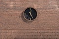 Vintage Station Clock On A Red Brick Wall With Copy Space