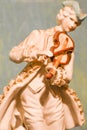 Vintage Statue of Englishman Playing Violin Royalty Free Stock Photo