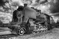 vintage steam train hurtling at speed along the rails Royalty Free Stock Photo