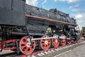 Vintage steam train hurtling at speed along the rails close-up, retro vehicle, steam Royalty Free Stock Photo