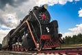 vintage steam train hurtling at speed along the rails close-up, retro vehicle, steam Royalty Free Stock Photo