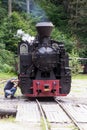 Vintage steam train locomotive being repaired