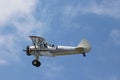 Red, White, and Blue Stearman Airplane Flying Royalty Free Stock Photo