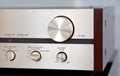 Vintage stereo amplifier huge volume control knob Royalty Free Stock Photo