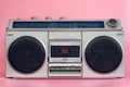 Vintage stereo on pink pasrel color background Royalty Free Stock Photo