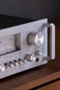 Vintage Stereo Receiver Front Panel with Controls Side View Closeup