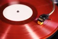 Vintage Stereo Turntable Plays Red Vinyl Record Album, Tonearm with Headshell Royalty Free Stock Photo