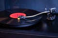 Vintage Stereo Turntable Plays Red Vinyl Record Album, Tonearm with Headshell Royalty Free Stock Photo