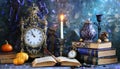 Vintage still life with antique books, clock and candle. Halloween and occult concept