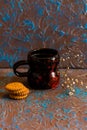 Vintage composition coffee in mug and biscuits