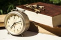 Vintage still life with old alarm clock, keys and books Royalty Free Stock Photo