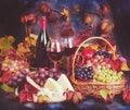 Vintage still life. Wine and grapes in a dramatic light Royalty Free Stock Photo