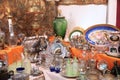 Vintage store with vintage tableware made of porcelain, glass and metal